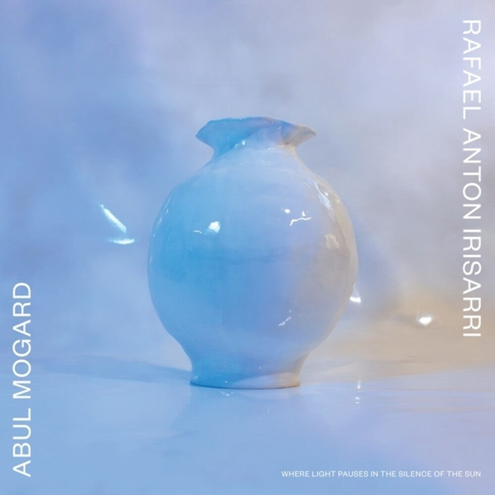 the album cover for Abul Mogard / Rafael Anton Irisarri - Where Light Pauses In The Silence Of The Sun