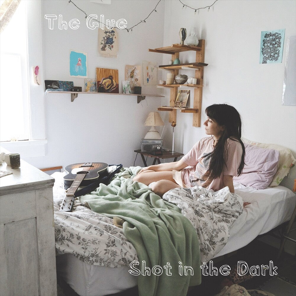 the album cover for Glue - Shot In The Dark