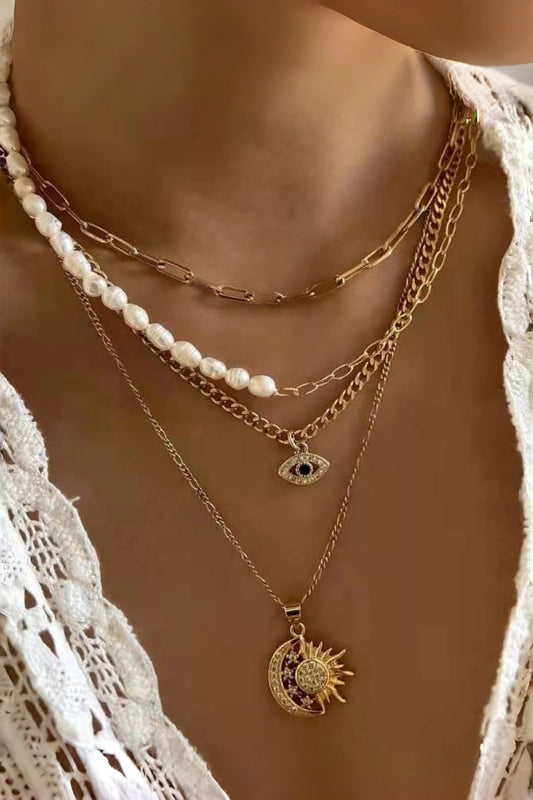 Gold Celestial Layered Necklace with Pearl Accents, Evil Eye & Sun Moon Pendants