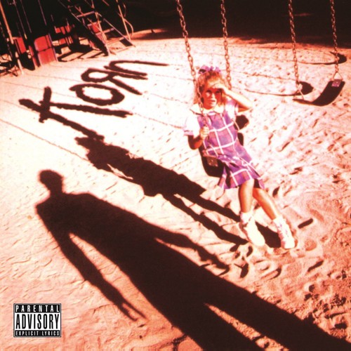 the album cover for Korn - Korn
