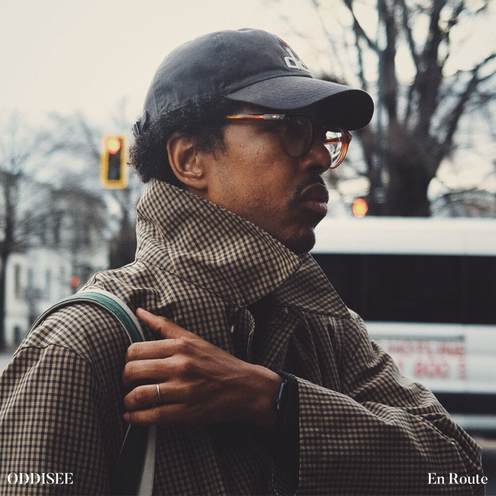 the album cover for Oddisee - En Route - Silver Nugget [Colored Vinyl] (Slv)