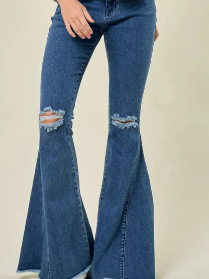 Distressed Knee Extreme Flare Jeans in Medium Wash