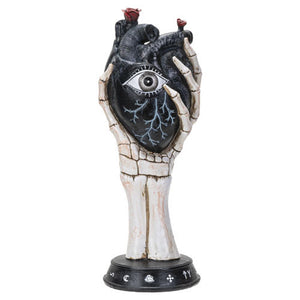 Skeleton Hand Holding Black Heart