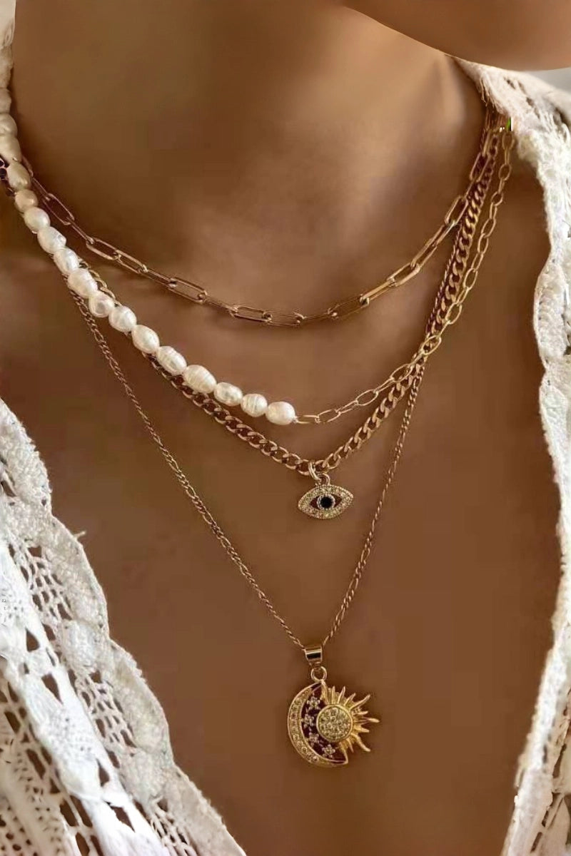 Gold Celestial Layered Necklace  with Pearl Accents, Evil Eye & Sun Moon Pendants
